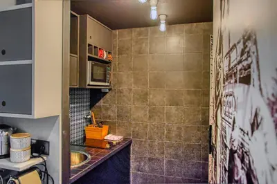 a small kitchen with a sink and a microwave at C074-Cannes Studio - Cannes Forville in Cannes