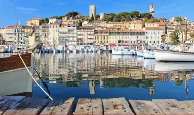 a group of boats docked in a harbor with buildings at Studio Blvd Carnot 10 min Palais Festivals - Balcony & AC in Cannes
