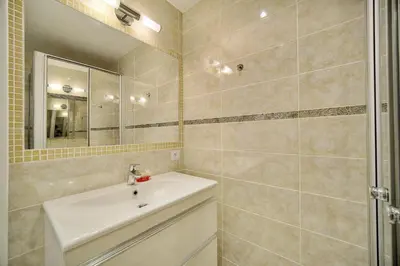 a bathroom with a sink and a mirror at Confortable 2 pièces, HYPER CENTRE- CENTRE VILLE A1B237 in Cannes