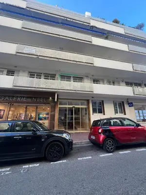 two cars parked in front of a building at Confortable 2 pièces, HYPER CENTRE- CENTRE VILLE A1B237 in Cannes
