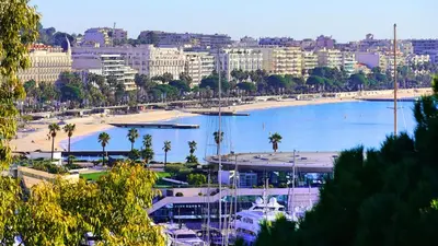 a large body of water with boats in a harbor at Proche Carlton & Croisette, Appartement 203 - Palmazur Vacances in Cannes