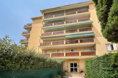 a tall building with balconies on the side of it at IMMOGROOM - Fully equipped - Terrace with sea view - AC in Cannes