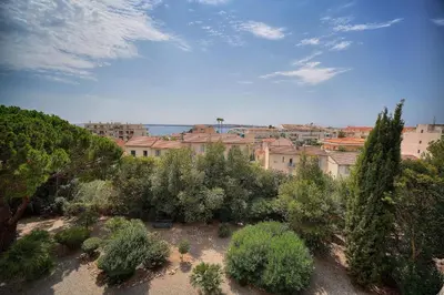 a view of a city with trees and buildings at IMMOGROOM - Fully equipped - Terrace with sea view - AC in Cannes