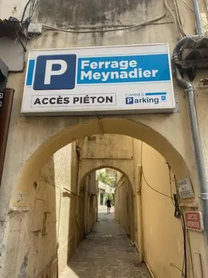 a sign on the side of a building with an archway at CROISETTE 8/10 pers in Cannes