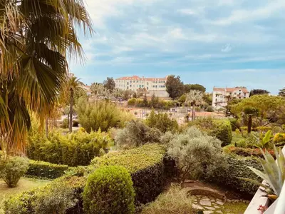a view of a garden with trees and bushes at MON2-Studio spacieux Cannes centre in Cannes