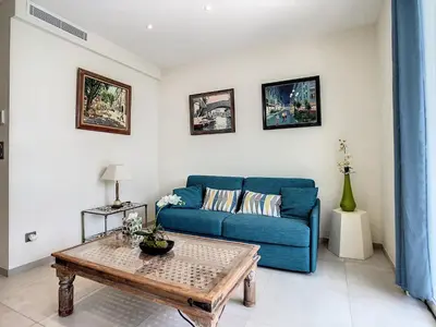 a bathroom with a sink and a shower at Beautiful 1 bedroom with garden on the Croisette 254 in Cannes
