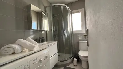 a bathroom with a shower and a sink and a toilet at Lovely studio in the heart of Cannes in Cannes