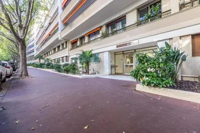an empty street in front of a building at LB Vacation Rentals I Cannes Croisette, Large Terrace, Free Parking, Beaches in Cannes