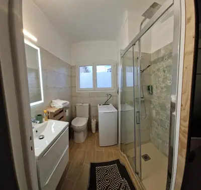 a bathroom with a toilet and a sink and a shower at Studio confortable 10 min du Palais des festivals in Cannes