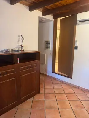 a kitchen with a counter top and a mirror at Le Suquet Appart in Cannes