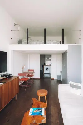 a living room and dining room with a loft bed at CANNES CENTRE VILLE- Bel appartement studio + Mezzanine in Cannes