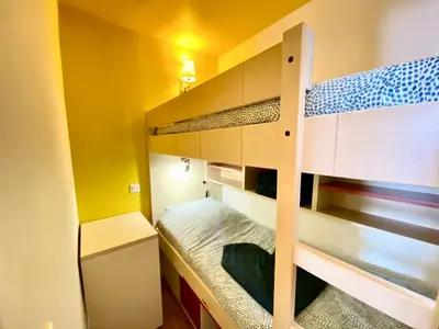 a bunk bed in a small room with a bunk bed in a room at Le Delacroix By SCLS Locations in Cannes