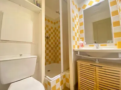 a bathroom with a toilet and a sink at Le Delacroix By SCLS Locations in Cannes