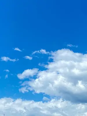 a blue sky with white clouds in the sky at Superbe 120m2 au Suquet - Property With Style in Cannes