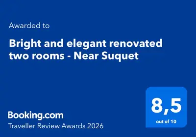 a screenshot of a phone with the text upgraded to bright and element renovated two rooms at Bright and elegant renovated two rooms - Near Suquet in Cannes