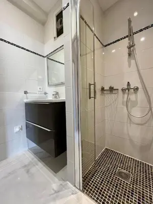 a bathroom with a shower and a sink at Bright and elegant renovated two rooms - Near Suquet in Cannes