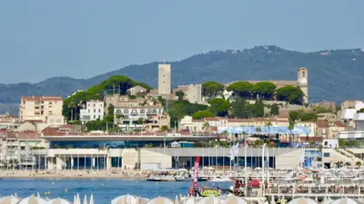 a city with a harbor with boats in the water at Townhouse in the heart of the suquet - 4 bedrooms in Cannes