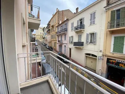 a view from a balcony of a street with buildings at C048 Studio Spacieux proche Plages et Palais in Cannes