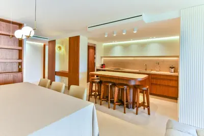 a kitchen with a table and some chairs at Luxurious apartment with terrace 6P - 3BR - Grand in Cannes