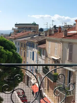 a view of a harbor with boats in the water at Place du Suquet - In the hart of old Cannes - 2 Min Walking distance from Palais de Festivals and Beaches in Cannes