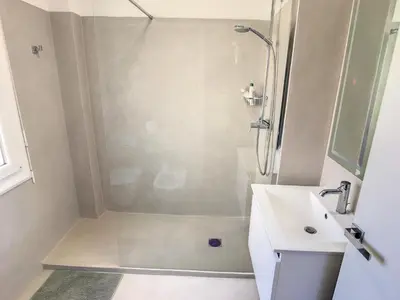 a bathroom with a shower and a sink at 2 bedroom, 2 bathrooms Suquet with sea view 314 in Cannes