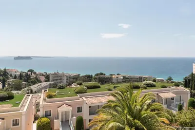 an aerial view of a house with the ocean in the background at Résidence Cannes Villa Francia - maeva Home - Appartement 2 Pièces 4 Personnes - Prestige MAE-8674 in Cannes