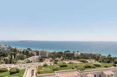 a view of a city with the ocean in the background at Résidence Cannes Villa Francia - maeva Home - Appartement 2 Pièces 4 Personnes - Prestige MAE-8674 in Cannes