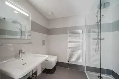 a bathroom with a sink and a toilet and a shower at REF 1071 - Cannes Center - 5mins to the Palais des Festivals in Cannes