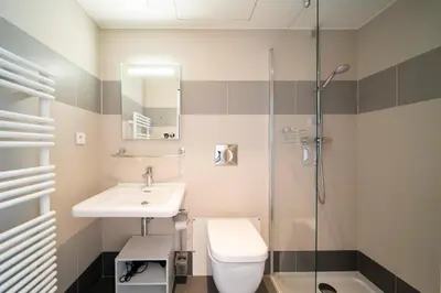 a bathroom with a toilet and a sink and a shower at REF 1071 - Cannes Center - 5mins to the Palais des Festivals in Cannes