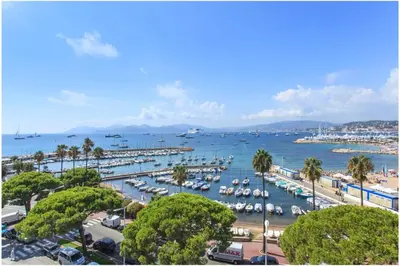 a harbor filled with lots of boats in the water at REF 1229 - Cannes Croisette - Sea view apartment for rent in Cannes