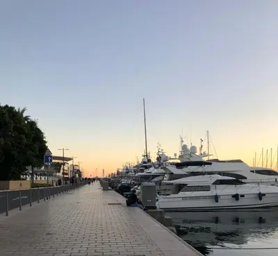 a row of boats parked in a marina at Évasion aux Portes de Cannes 100m2 Lumineux 2 Chambres Terrasse et Commerces in Le Cannet