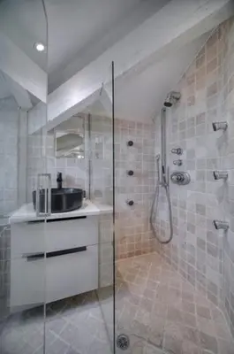 a bathroom with a shower and a sink at Luxury 2-floor Flat minutes walk to Croisette and City Center in Cannes