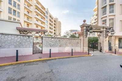 an entrance to a building with a gate at Appartement cosy à Cannes - 40 m² avec balcon et vue mer in Cannes