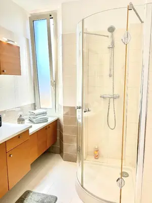 a bathroom with a shower and a sink at Top emplacement centre Cannes in Cannes
