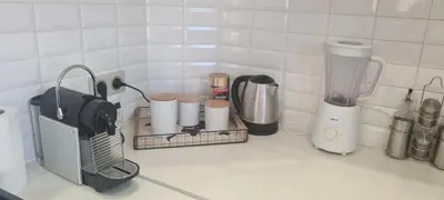 a kitchen counter with a blender and other kitchen items at STUDIO CANNES STELLAMARE in Cannes