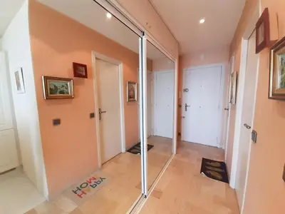 a hallway with glass doors in a home at Trident in Cannes
