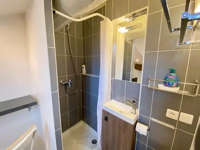 a bathroom with a shower and a sink at Mini Studio - Le Chabaud - Cannes centre in Cannes