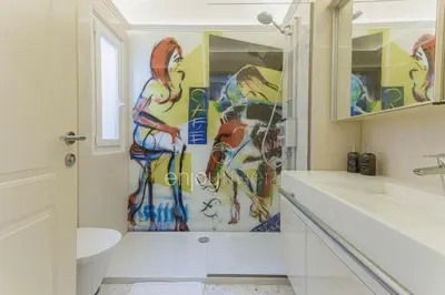 a bathroom with a shower and a sink at Palais Miramar Suite Art Modern - Derniere étages Vue Mer - 75m de confort - En Face des Plages -WIFI - Clim in Cannes