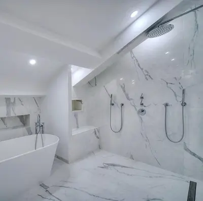 a white bathroom with a tub and a shower at Sumptuous renovated Penthouse - Gray d'Albion-Croi in Cannes