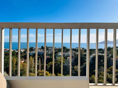 a view from the balcony of a house at Large, light and modern 2 bedroomed apartment in Cannes with Sea Views, pool and lovely terrace - 1503 in Cannes