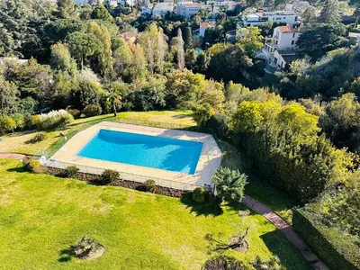 an overhead view of a swimming pool in a yard at Large, light and modern 2 bedroomed apartment in Cannes with Sea Views, pool and lovely terrace - 1503 in Cannes