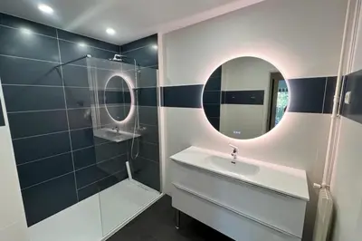a bathroom with a sink and a mirror at Le Gallia haven of peace in the city center with Terrace GALLIA LYS in Cannes