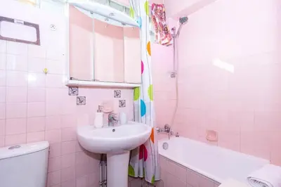 a bathroom with a sink and a toilet and a tub at Cosy Studio Cannes Center beaches shopping and congresses LIVE IN MERLE in Cannes