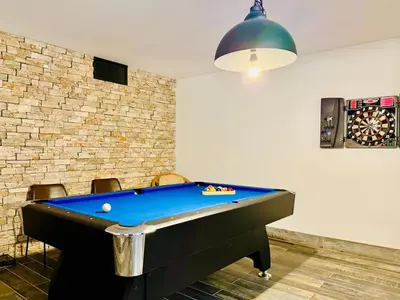 a pool table in a room with a ping pong ball at Superbe Villa - Cannes Centre -Proche Palais des Festivals et Plages in Cannes