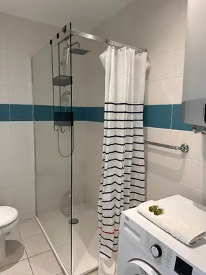 a bathroom with a shower with a glass door at One bedroom apartment in Cannes with a balcony and great sea views - 821 in Cannes