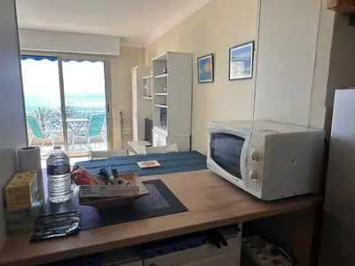a microwave sitting on top of a kitchen counter at One bedroom apartment in Cannes with a balcony and great sea views - 821 in Cannes