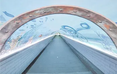 a view of a tunnel with a painting on the wall at 1 Bedroom Beautiful Apartment In Cannes in Cannes