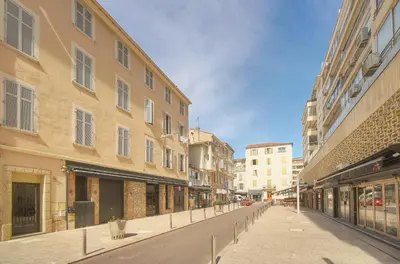 an empty street in a city with buildings at Moderne 2 chambres, CARRE D'OR- COEUR DE CANNES A2B194 in Cannes