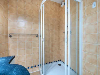 a shower with a glass door in a bathroom at Apartment Cristal Croisette-4 by Interhome in Cannes