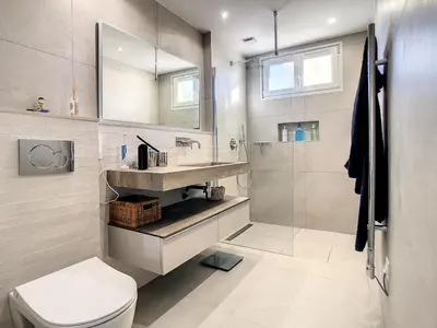 a bathroom with a toilet and a sink and a shower at Penthhouse 1 & 2 bedroom apartment 2 mins from the Croisette 335 in Cannes